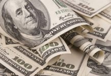 Гривна снизилась на межбанке до 25,69 грн/$