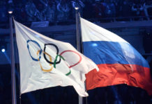 МОК вернул России флаг и гимн