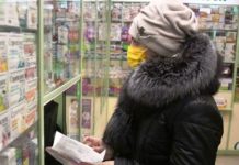 90% увольнений. Каким украинский бизнес выйдет из новогоднего локдауна женщина в магазине